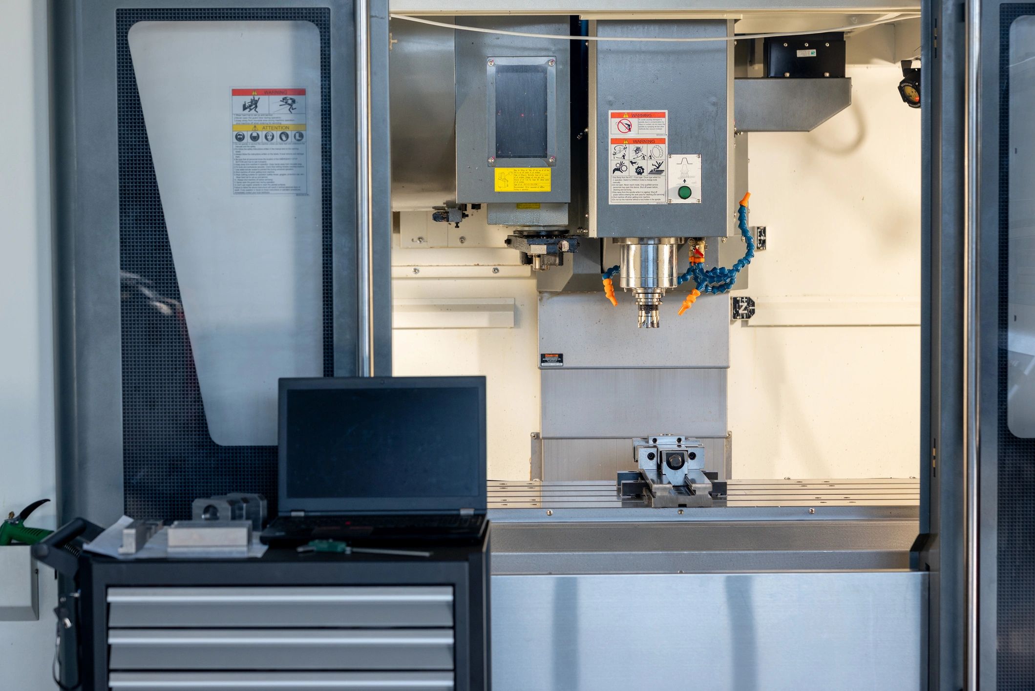 CNC milling machine interior for precision five-axis production